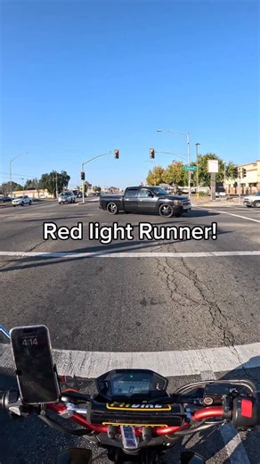 This car ran a red light almost causing an accident. Terrible! #redlight #runner | Grippy Rip