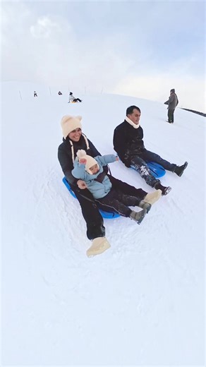 Sledding Fun at Moerenuma Park in Sapporo