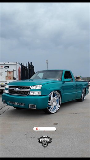 Teal Chevy Silverado single cab on 26” Forgiato wheels