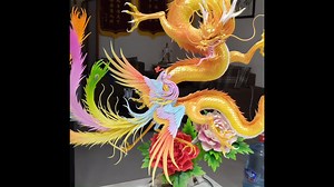 1.5K views · 51 reactions | #Dragon and #Phoenix dance to notes of wellness & prosperity Sculpture artist, Li Wen spent 7 days, altogether, on this symbolic #sculpture, with height and width of 30cm and 19cm, respectively. Dragon and Phoenix are good signs in #Chinese society. By completing a craft as such, Li wishes the country and its people happy and affluent. Always. | T-Time HK | Facebook