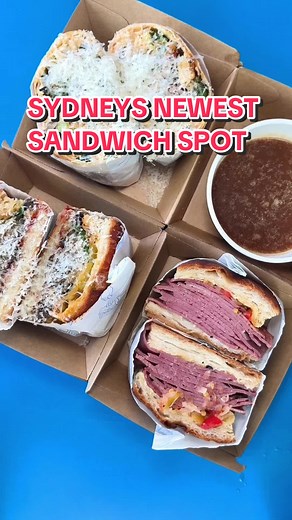 SYDNEY’S NEW SANDWICH SPOT! 🥪✨ We made our way to @Cross Section in Darlinghurst and tried: - The Bear: Corned beef, caramelized onions, djoanise sauce, and a beef dip. - Caesar Wrap: Fully loaded with fresh ingredients. - No. 82: Roasted eggplant, cheddar, red pesto, Neapolitana sauce, and fresh basil. Washed them down with their batch brews. 📍 Cross Section, Darlinghurst