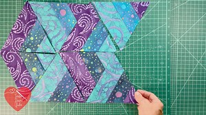 This project is absolutely fantastic for anyone looking to unleash their creativity and make use of those leftover jelly rolls tucked away in the cupboard. The possibilities are boundless – you can create beautiful quilts, charming table runners, or even stylish tote bags. This is an exclusive Patreon video tutorial. Join to watch it in full: https://patreon.com/teresadownunder | TeresaDownUnder