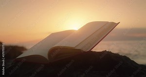 Open book on nature background. Learning is light and ignorance is darkness. Ancient scripture.