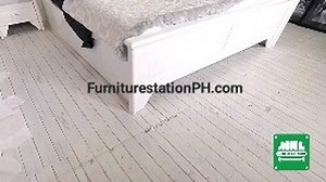 Embrace simplicity and serenity with this minimalist bed, designed to...