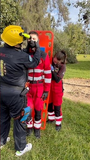 Spinal board immobilization in standing position (TEMT) for trauma patients in standing position.