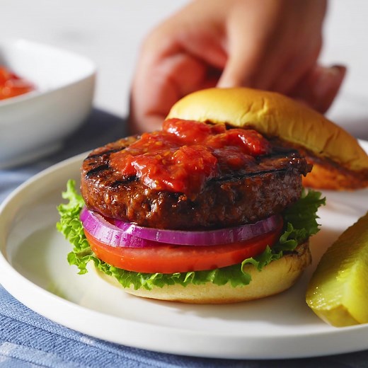 #ad Made with Gardein® Ultimate Plant-Based® patties, these burgers with tangy tomato jam are easy to prep before a barbecue. | Allrecipes