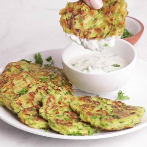 890K views · 15 reactions | These easy to make Zucchini Fritters make for a great appetizer or side. Wonderfully seasoned, they are a tasty way to get some veggies into your meals! https://feelgoodfoodie.net/recipe/zucchini-fritters/ | Feel Good Foodie | Facebook