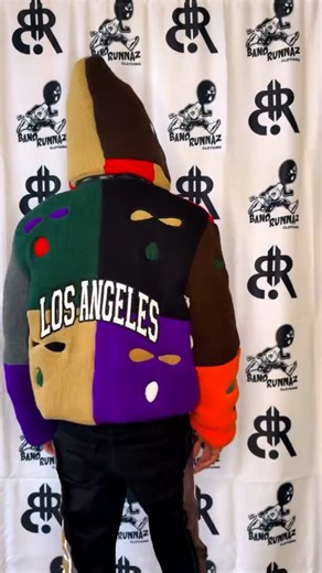 Custom WearHouse on Instagram: "Ski Mask Puffer Jacket ⛷️⛷️⛷️ by @lpmonte . This designer turns ski masks into a puffy winter jacket with the LA logo! I love how the eye holes are all different colors. What do you think? . . . #pufferjacket #winterwear #winterjacket #winterstyle #skijacket #skimask #streetweardaily #streetwear #streetwearculture #customjacket #designerwear #wintercoat"