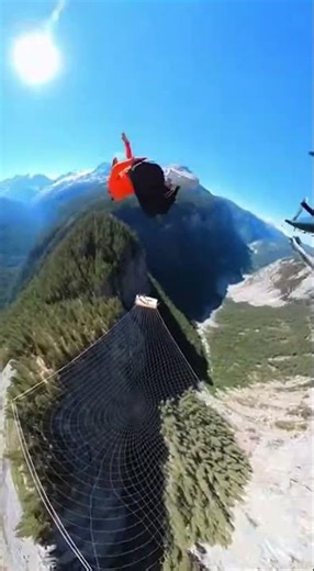 Girl Jumps From a Helicopter 😳🔥 Perfect Net Landing! #Shorts #Viral