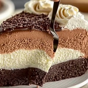 Italian Love Cake Recipe Ingredients: 1. 1 box chocolate cake mix (plus eggs, oil, and water per package) 2. 2 lbs ricotta cheese 3. 4 large eggs 4. 1 cup sugar 5. 1 tsp vanilla extract 6. 1 package (3.9 oz) instant chocolate pudding 7. 1 1/2 cups cold milk 8. 8 oz whipped topping, thawed Directions: 1. Preheat your oven to 350°F (175°C) and grease a 9x13-inch baking dish. 2. Prepare the chocolate cake mix batter as directed on the package and pour it into the pan. 3. In a separate bowl, mix ric