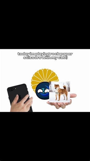 Playing Rock, Paper, scissors with my “cat”￼