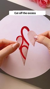 You can easily cut out beautiful paper-cut window decorations by drawing three half-hearts. It's simple and pretty, so try it with your kids! #papercutwindowdecorations #NewYearpapercutting #fblifestyle | hand made crafts for kids