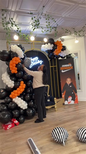 Adding some finishing touches to the backdrop! This was one of my favorite boy party themes so far!