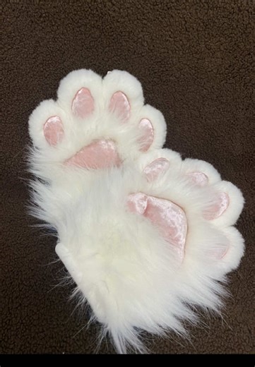 POV: you just got your first pair of fursuit paws 🐾✨ Soft, fluffy, and perfect for completing your fursuit look! Whether for conventions, cosplay, or just feeling extra cute 🦊🧸 These fursuit paws are 100% handmade, and I can make a custom pair especially for you 🪡🐾 If you want your own pair, you can buy them through the link in my profile 🔗 What animal paws would you choose? 👀 #furry #fursuit #handmade #cosplay #fyp