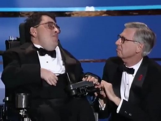 13K views · 237 reactions | 殺That was such a heartwarming and memorable moment! In 1999, during his TV Hall of Fame induction, Mr. Rogers reunited with Jeffrey Erlanger, a guest from his show as a child. It was a touching moment that highlighted Mr. Rogers' lasting impact and genuine connections with people. #MrRogers #JeffreyErlanger #Heartwarming #Reunion | CgoMovies | Facebook
