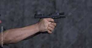 Close-up pistol Stoeger STR-9 Striker Fired 9mm, single shot at shooting range in super slow-motion 800 fps