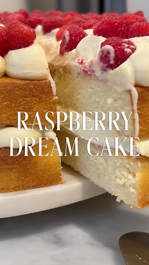 This hot milk sponge cake is filled with custard cream kisses and crowned with raspberries and a fleck of gold leaf. It’s a sumptuous choice for a special celebration. For the recipe visit our Sprout link in bio. #cakecakecake #cakedecorating #cakedesign #cakes | Women's Weekly Food