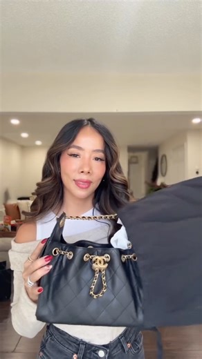 Sandy Azcona on Instagram: "Still can’t believe this beauty is finally mine 🤍 Timeless, classic, and worth the wait ✨ #LuxuryFind #chanelunboxing #chanel25 #chanelbag"
