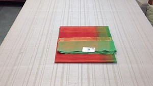 Sarangi Handwoven Silk Cotton Sari - 1363187ORA Price : ₹ 5,590.00 INR ~~~~~~~~ The silk body is drenched in a shimmer of sunset orange, radiating energy, warmth and joy. The effect is both, magical and mesmerizing. Gold stripes on both ends lead to a citric green border, a delicate blend of soothing green and vibrant orange woven together. Three panels of gold stripes light up the leaf green silk pallu. Shop this sari: http://amp.gs/NvNt ~~~~~~~~ Buy this saree online: ★ Free Shipping Worldwide