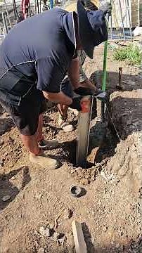 Concrete sleeper retaining wall construction, steel posts installation #maxdesignandconstruction