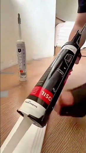 Installing flexible baseboard trim for a clean and seamless connection between wall and wooden floor