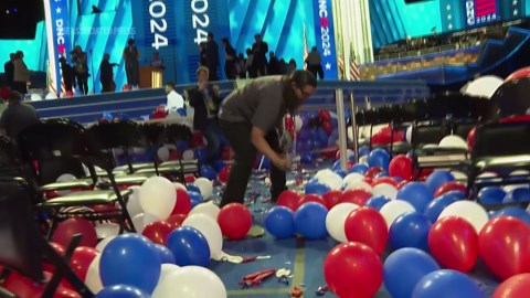United Center crews pop thousands of balloons that dropped during Democratic National Convention