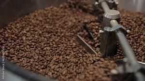 Experience the art of coffee roasting as beans are expertly roasted and stirred in a traditional roaster. Watch the mesmerizing process unfold, from heating the beans to releasing rich aromas.