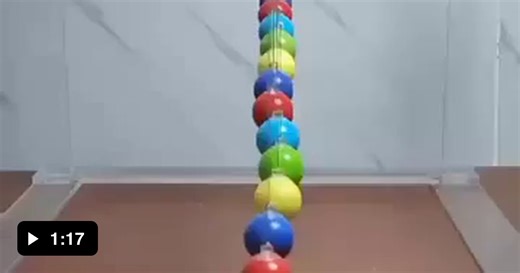 Watch how pendulums of different lengths create a mesmerizing wave pattern. - Video