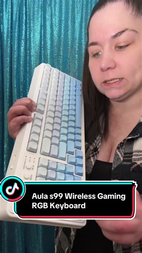 The AULA S99 Tri-Mode Gaming Keyboard is built for gamers, students, creators, and anyone who wants a dreamy setup that performs as good as it looks. This creamy retro keyboard connects 3 different ways; Bluetooth 5.0, 2.4GHz wireless, or USB-C wired; and can switch between up to 5 devices instantly. Type on your laptop, tablet, phone, and PC with one keyboard. Enjoy a smooth, mechanical-feel typing experience with fixed keycaps, a full number pad, and a quiet click that feels satisfying without