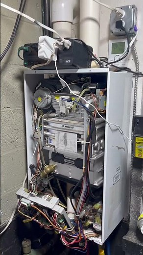 Troubleshooting Navien CH-210 Water Heater Leaks and Hot Water Problems