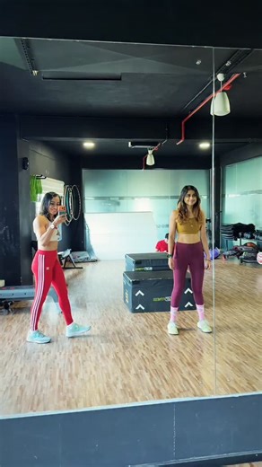 Sandra on Instagram: "Challenges have become our cool-down routine now 😅 Try this with your gym bestie 😬 #squat #challenge #gymselfie"
