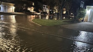 Massive water main break floods Needham streets, causes sinkhole