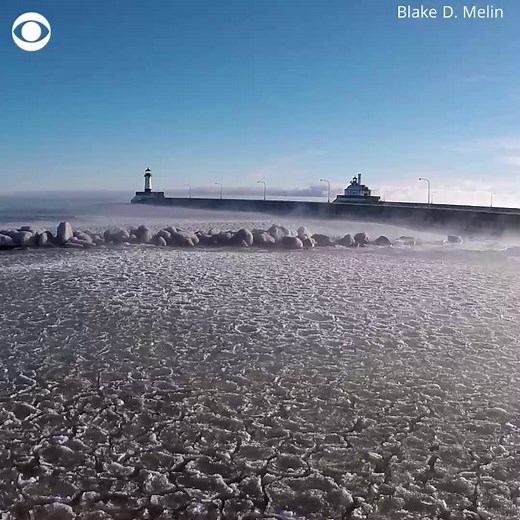 CHILLS: Drone video captures a freezing Lake Superior giving off steam on New Year's Day https://cbsn.ws/2CKvrJ7 | CBS News