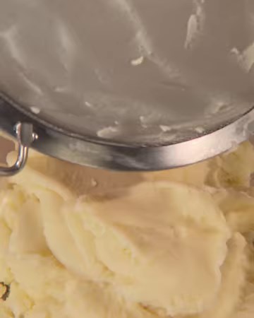 Looking for an upgrade to your usual mashed potatoes? Try Martha's recipe for a silky smooth potato purée. She steams russet potatoes, uses a fine-mesh sieve to strain them, and adds a mixture of brown butter and heavy cream to create a decadent potato dish everyone will love. https://bit.ly/3Wz34nC | Martha Stewart