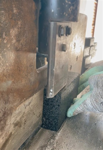 Industrial Machine Cutting Basalt Stone in Action