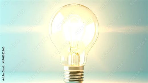 Illuminated light bulb on a light blue background, symbolizing ideas, innovation, and creativity.