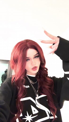 Stylish Hand Gestures by a Person with Red Hair