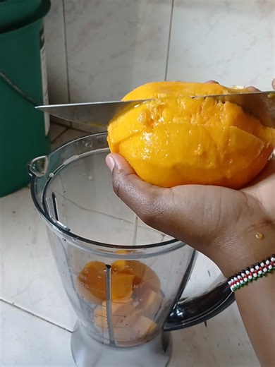 Refreshing Mango Juice Made in a New Blender