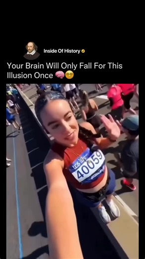 Inside Of History on Instagram: "Your brain will only fall for this illusion once. The girl stood perfectly still in the middle of the marathon route, and the way she recorded the clip made everyone behind her look like they were walking backward. For a split second, your mind thinks she’s on some kind of moving escalator pushing her forward. This wild visual trick happens because the backward motion of the runners clashes with her still frame, creating a one-time optical illusion. The moment yo