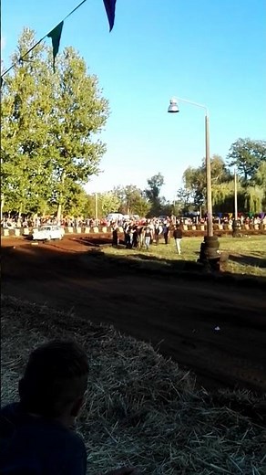 After the rollover, the Trabi is carried off the racetrack.