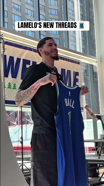 LaMelo Ball poses for photos with his new jersey for the first time 👀