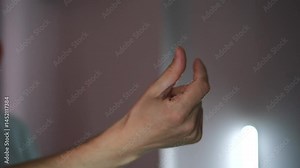 Man snapping his fingers close-up. Man's hand making a hand gesture. Slow motion hand clicking and snapping
