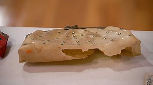 A purse frozen in time was found during renovations. Here's how they tracked down the owner's family