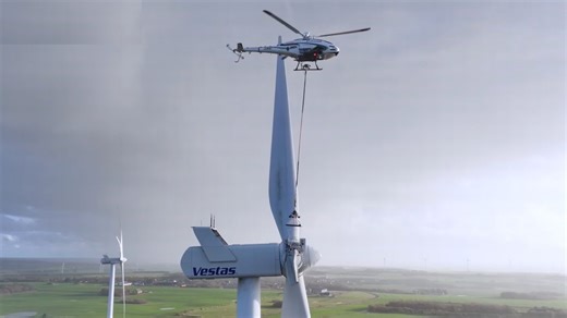 Autonomous robot takes helicopter ride to service wind turbine blades