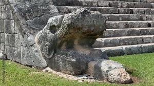 Jaguar Head at the bottom of El Castillo in the Chichen Itza archaeological site in Yucatan, Mexico