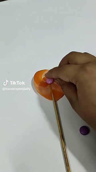 Mixed Doodly Lollipop with Gems chocolate and accidentally invented rainbow crack 🍭🌈💥 This is either genius or illegal. YOU DECIDE. 👇 #fyp #yum #candytok #sweet #tik_tok #trending