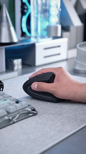 250K views · 877 reactions | ️ Ergonomic vertical mouse with RGB lights, designed for ease and wrist support. Smooth performance, precise control, and a healthier way to game or work long hours.  Find it at https://temu.to/m/gix9bil8mdk or with this code fem2336. #Temu #TemuFinds #TechDeals | Temu | Facebook