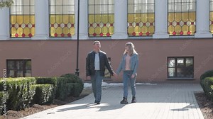 Couple in love walks in the park.
