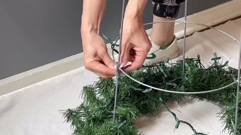 The BRILLIANT new way people are using Walmart wreaths on the porch!