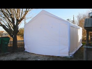 We built a PEAKTOP OUTDOOR 12 x 20ft Upgraded Heavy Duty Carport/Garage with Removable Sidewalls